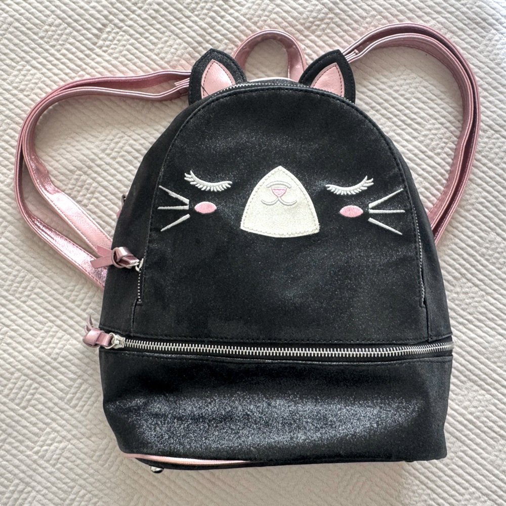 Black Cat Backpack with Pink Accents under one sky